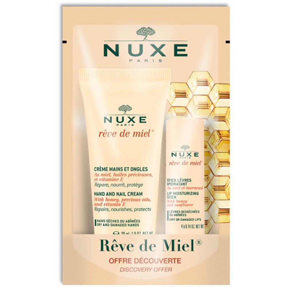 Zwei Nuxe-Produkte gegen trockene Haut auf honigfarbenem Hintergrund.