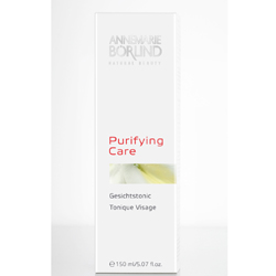 Weiße Verpackung eines Gesichtstonics mit Aufschrift "Purifying Care".